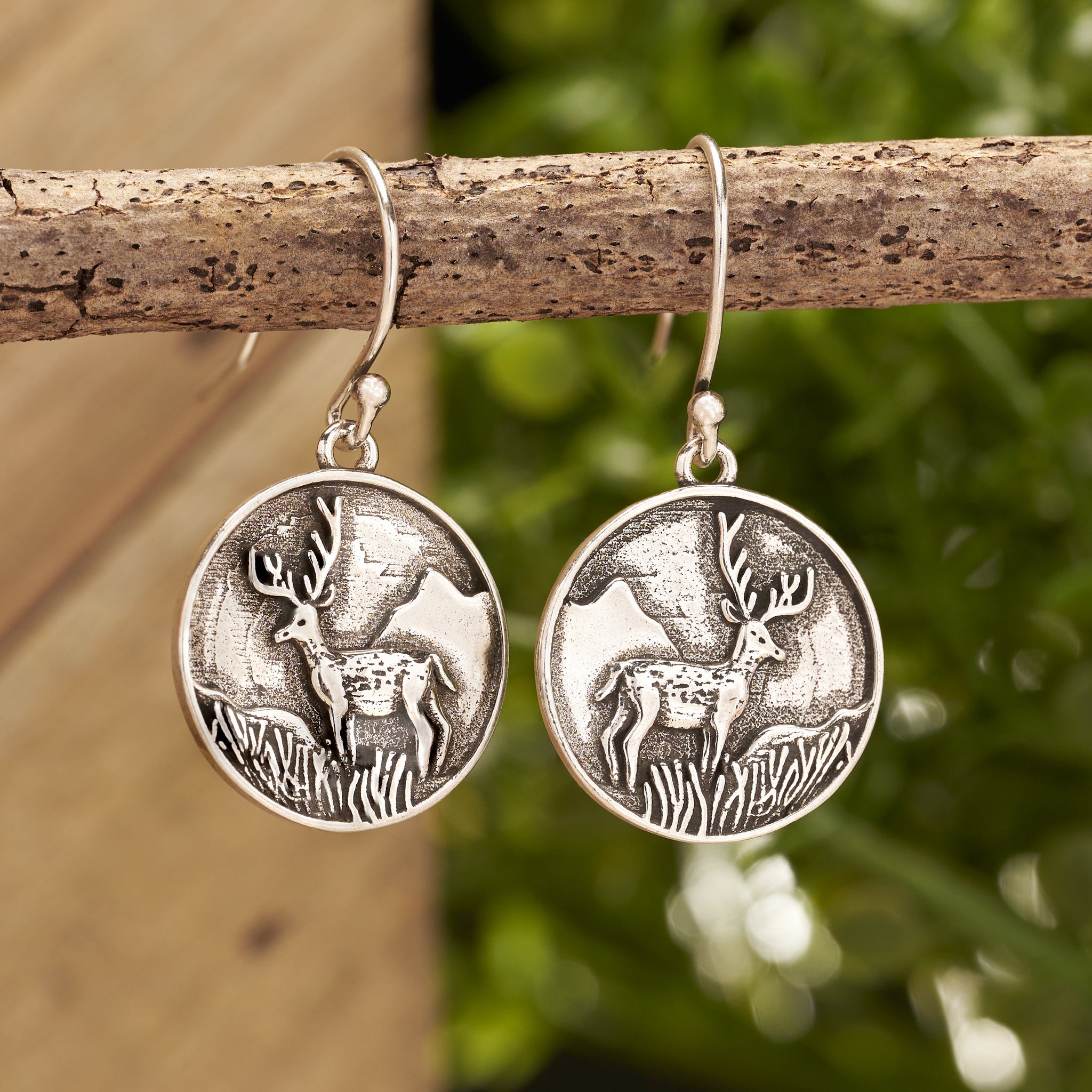 Silver earrings with deer shops print