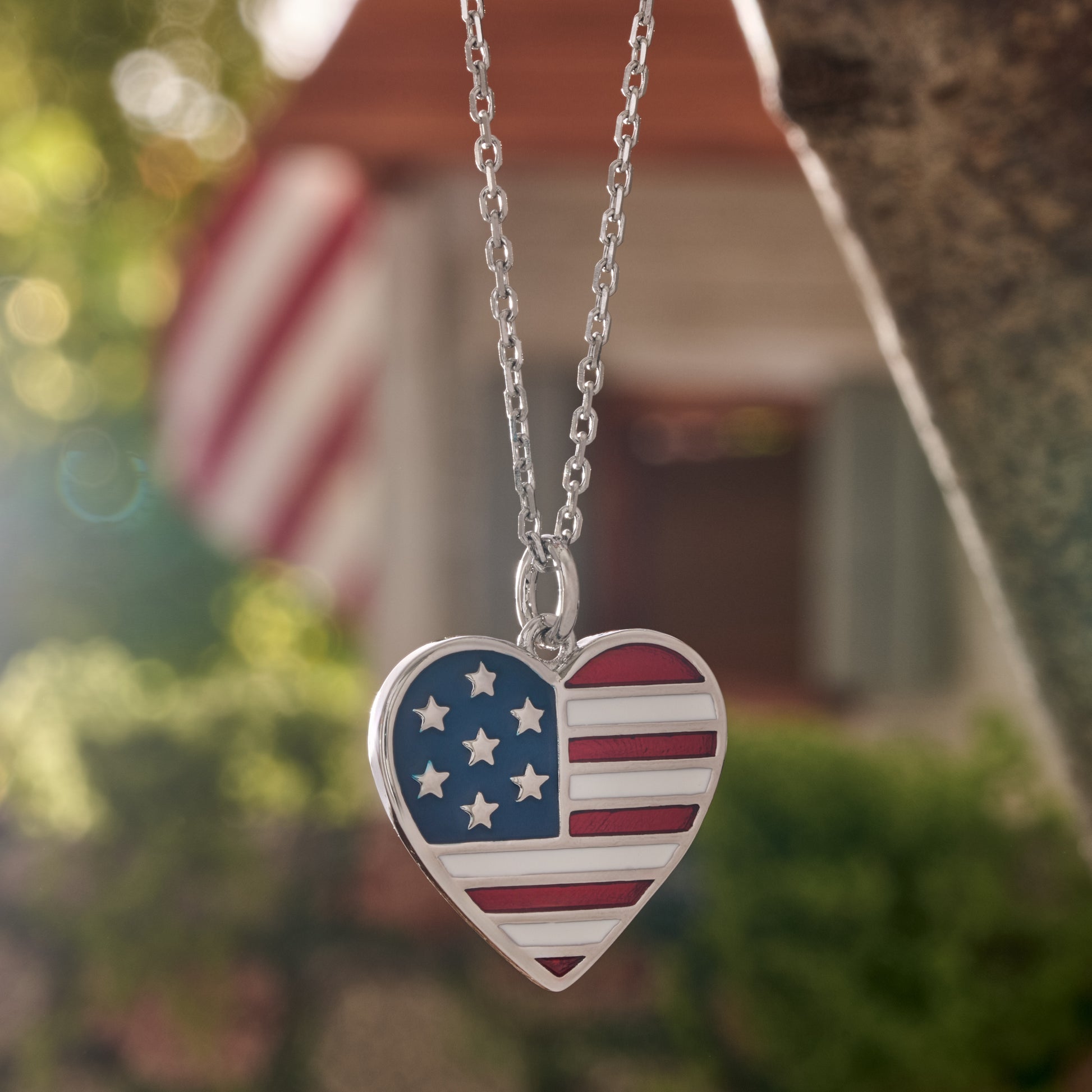 Patriotic American flag heart pendant necklace with red white and blue enamel for July 4th and USA 250th anniversary
